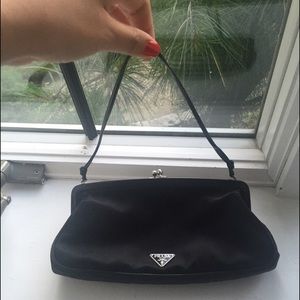 Prada evening clutch and leather handle