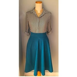 H&M Jade colored midi swing skirt.