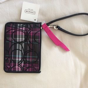 Brand new Coach wristlet