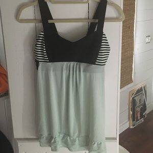 lululemon mint green and black workout tank top.