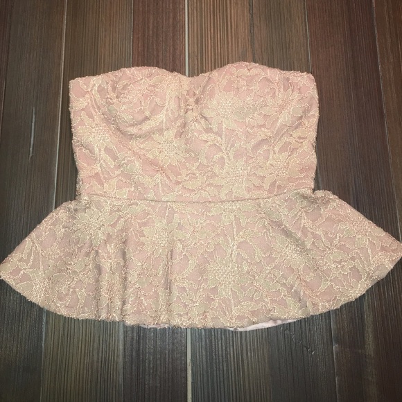 Blush strapless peplum shirt