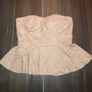 Blush strapless peplum shirt