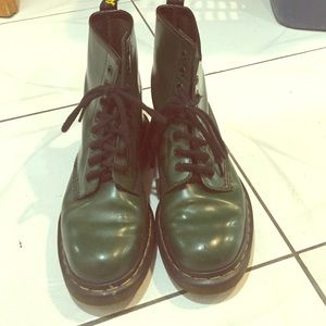 Dark green dr martens.