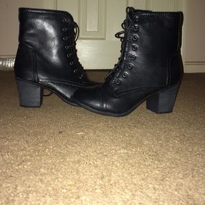 Black heeled combat bootie