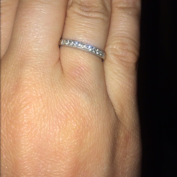10k white gold diamond studded wedding band. Size7