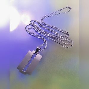 RAZORBLADE ON A CHAIN