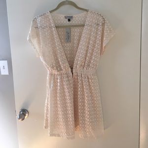Cream colored beach cover up, never been worn!