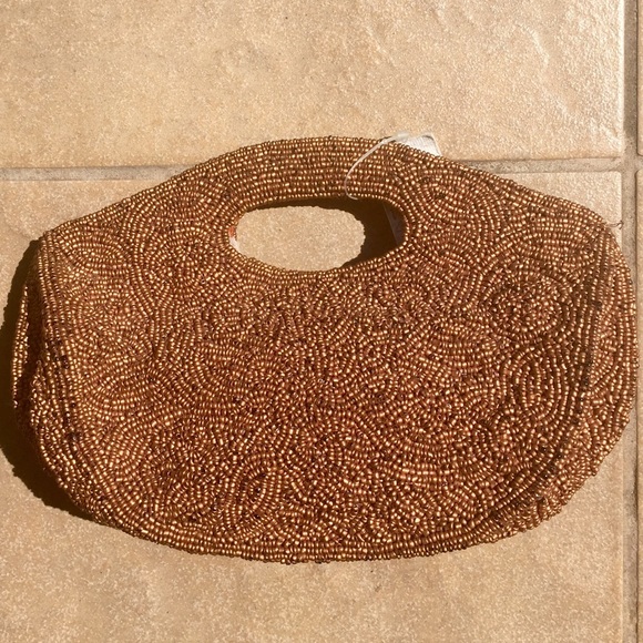 Individually hand crafted beaded bag.