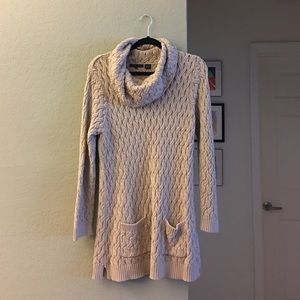 Tan cowl neck sweater dress.