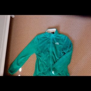 An aqua North Face fleece