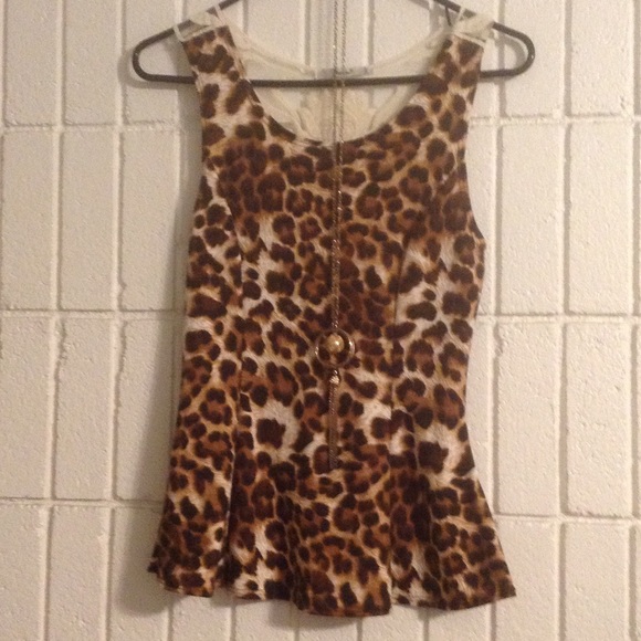 🌟Lepard Peplum Top✅IN BUNDLE ✅ - Picture 1 of 3