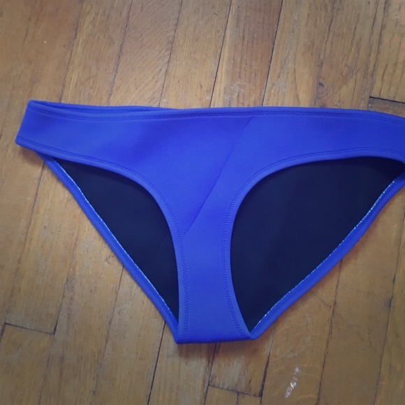 Never wore triangl swimsuit bottoms