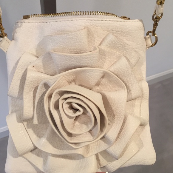 White bag with a rose.