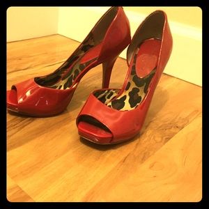 Red patent leather pumps