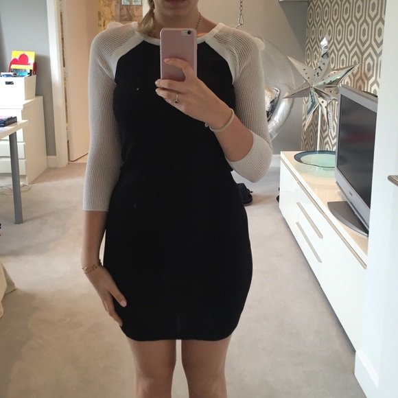 Black dress with white mesh sleeves