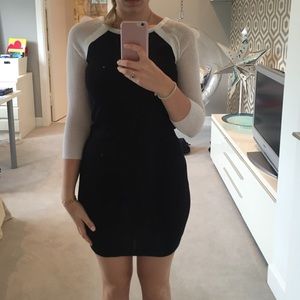 Black dress with white mesh sleeves