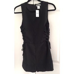 Knit romper with lace up sides