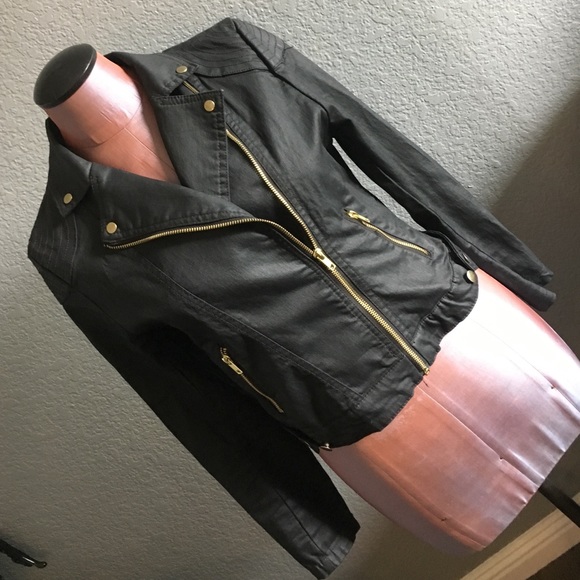 Black jacket with gold zippers