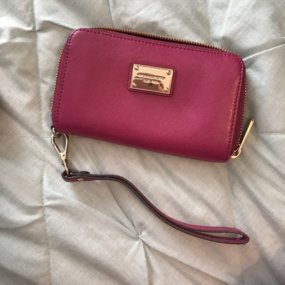 Pink Michael Kors Wristlet.