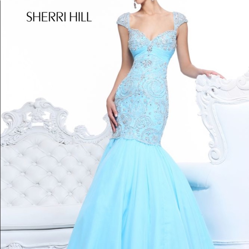 Powder blue Sherri Hill cap sleeve mermaid gown