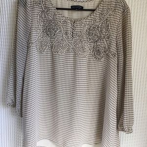 Neutral blouse with gorgeous detail