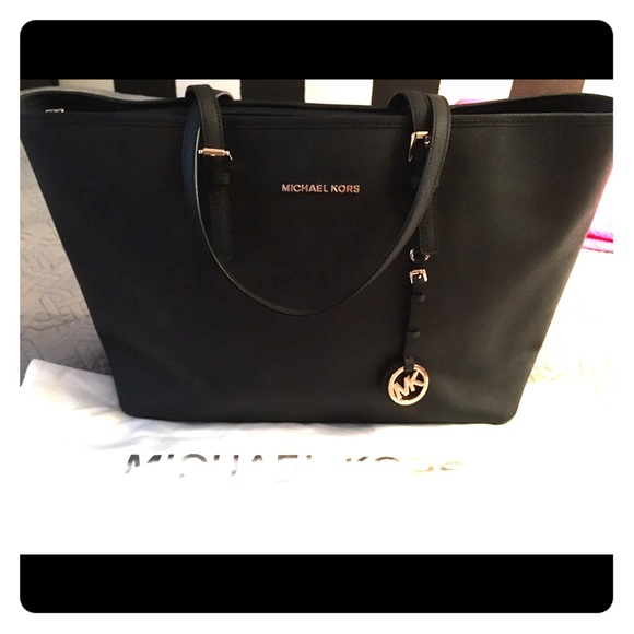 Gently used Michael Kors work and laptop tote