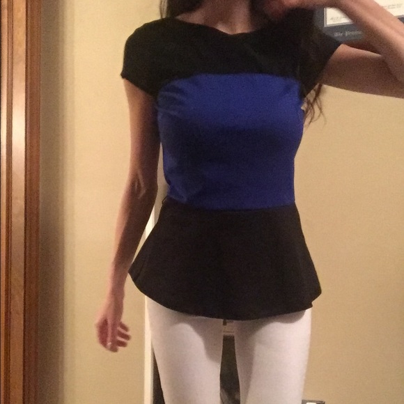 Adorable navy and black peplum top
