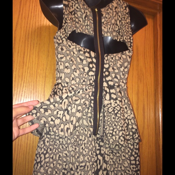 Back detailed peplum cocktail dress