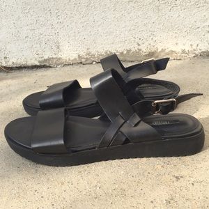 Black leather buckled sandals