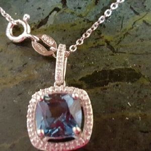 .925 & 18k White Gold with Blue Topaz & White Sapp