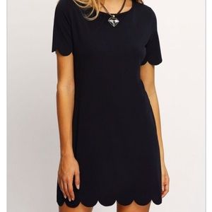 Black scalloped hem dress
