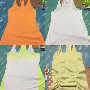 Lot of xs and small Nike & Athleta  workout tops.