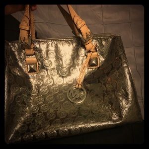 Slightly used Michael Kors purse, gold
