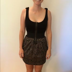 Little black dress with a gold pattern