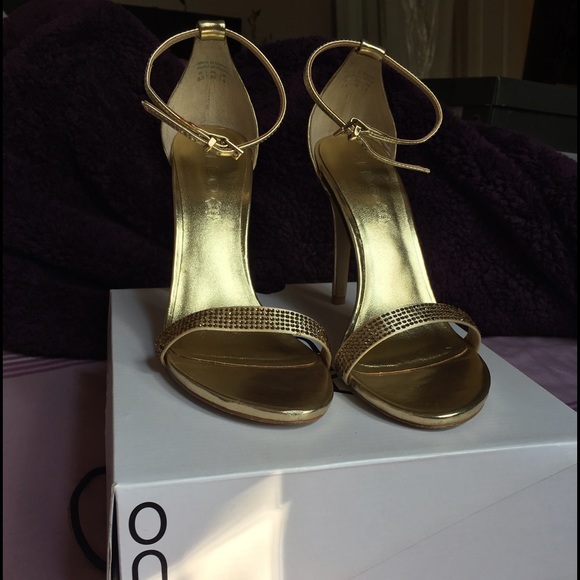 Gold strapped heels