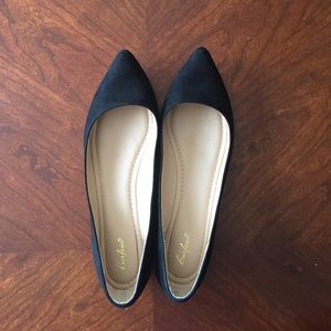 Black pointed flats