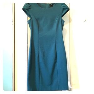 Fitted, teal, business casual dress.