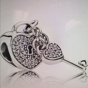 Heart and key charm (like new)