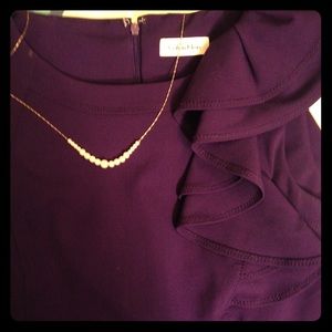 Beautiful CK purple dress with ruffle accent