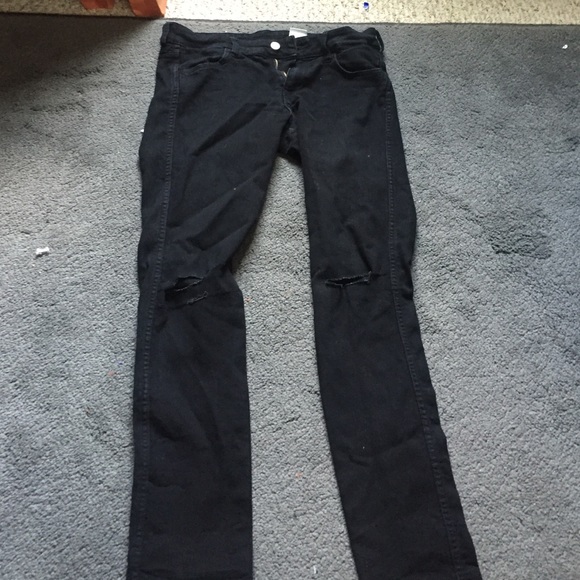 H&M black ripped knee jeans