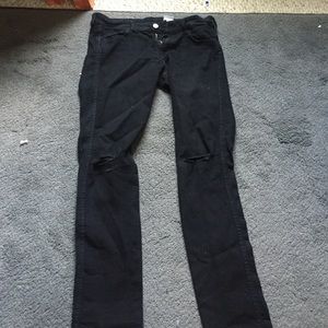 H&M black ripped knee jeans