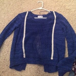 blue sweater with open back