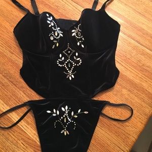 Cacique black velveteen bustia and thong .