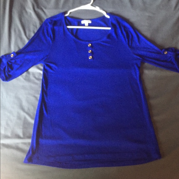 Royal blue blouse with gold accent buttons