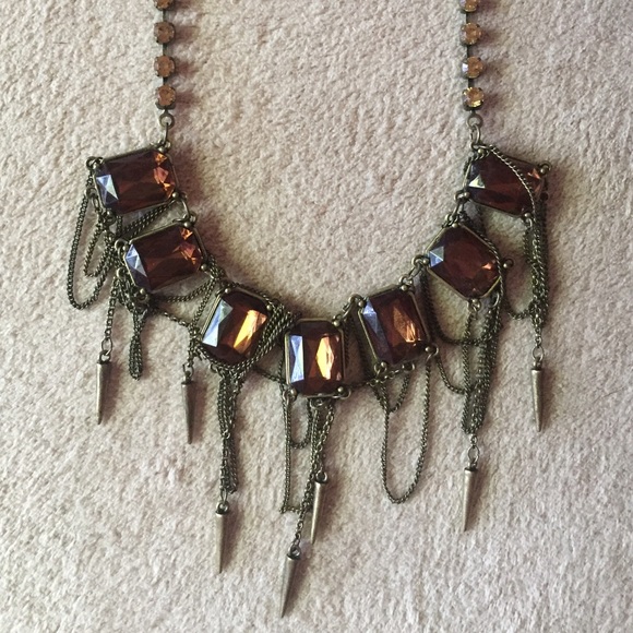 Brown gem necklace with hanging spikes