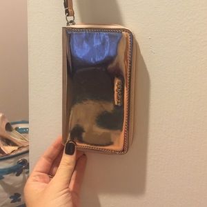 Coach wristlet (rose gold)