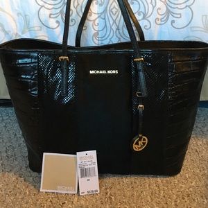 Lightly used Michael Kors jet set travel tote