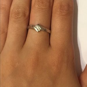 10k white gold ring with three diamonds