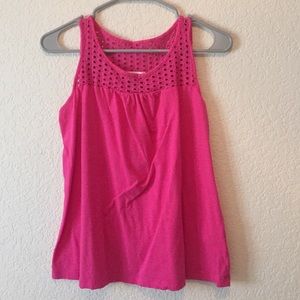 Pink tank top with detailing at the top.