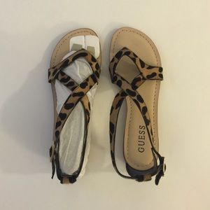 Guess flat sandals.